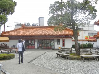 Inside of the park, facing the small gift shop where visitors can purchase &quot;Jofuku tea&quot; and &quot;Jofuku wine.&quot;