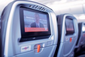 The flight&#39;s instructional safety video is brought to all passengers by the seat back entertainment system