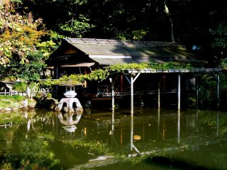 A teahouse built on the edge of a pond. The striking stone lantern has been moved since these photos were taken.