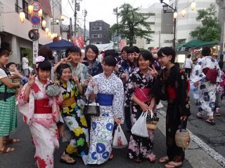 Lovely young ladies wear their yukata and kimonos to the event.
