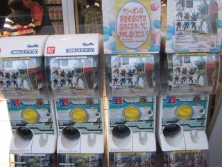 Vending Machines with Gundam related toys outside of the cafe