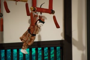 A marionette doll in action at the Karakuri Museum.