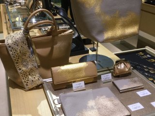 Gold bags, wallets, clutches.