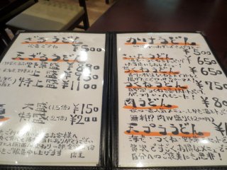 The handwritten menu with affordable prices and details about each dish