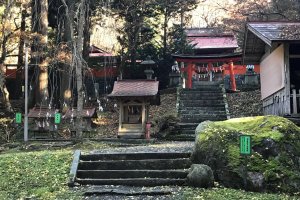 Some steps lead to a shrine building