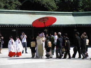 Red wagasa at a traditional wedding ceremony