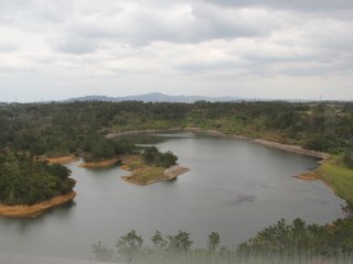 The reservoir created by the Kurashiki Dam was once a rural village prior to World War II, then used by the U.S. military as a supply depot prior to the creation of the Dam