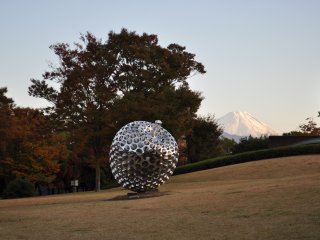 A spiky sculpture with Mt. Fuji in the background