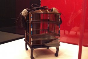 Bird cage with glass beads