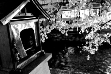 <p>Along the river, &nbsp;a small shrine</p>
