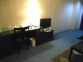 Writing desk of the suite room at Century Plaza Hotel Tokushima. The suite has 2 TVs, one in the living room and the other in the bedroom