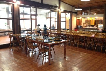 <p>The Tazawako&nbsp;Youth Hostel dining room reminds me of a school hall, but the food is much better.</p>