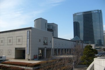<p>I can do art as well: the museum seen from outside, with Landmark Tower reflected in the neighbouring building.</p>