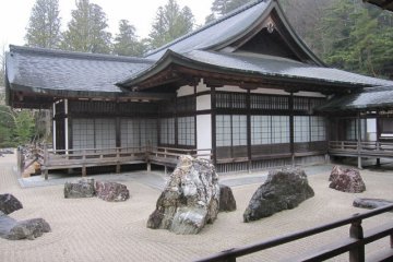 <p>This is the largest rock garden in Japan. The rocks (from Shikoku, birthplace of Kobo Daishi) represent 2 dragons emerging from a sea of clouds to protect the Okuden (a section of the Kongobuji)</p>