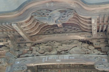 <p>Main building has this magnificent carving with dragon and eagle</p>