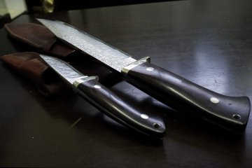 <p>The Takamura brand not only manufactures kitchen knives, they make some beautiful hunting knives as well, accompanied with handsome leather cases.</p>
