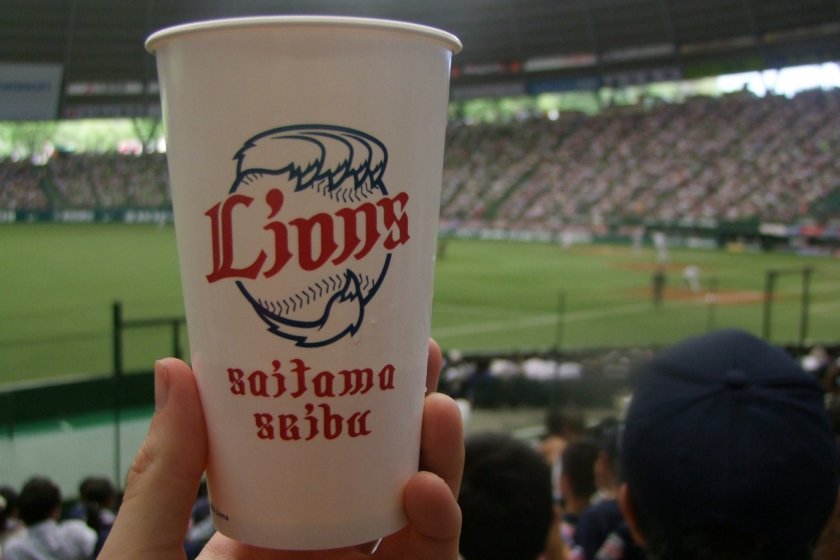 A frosty beverage and a baseball game: this is summer