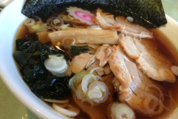 <p>Try the Roast Pork Ramen for 800yen. It will compliment your sashimi order so well!</p>