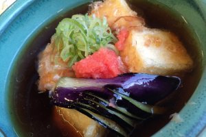 Must try the Fried Tofu which is served in broth, topped with shallots and eggplant.