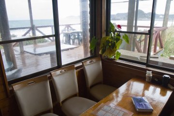 <p>The sea is visible from inside the cafe</p>