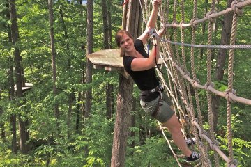 Swing like Tarzan, look like Jane. My friend Rebecca moves swiftly across the ropes. Piece of cake!