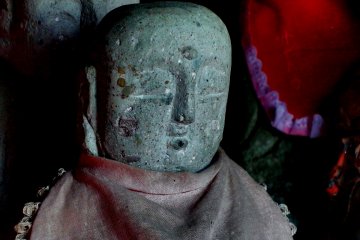 <p>Closer look at one of the Jizo statues. He has a peaceful look on his face</p>