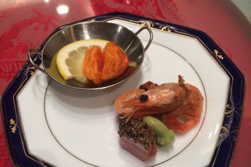 <p>Appetizer. The courses here are delicately presented in a way that is similar to French or Japanese Kaiseki style. The pork&nbsp;in a sweet and spicy sauce flavored with star anise is appealing.&nbsp;&nbsp;</p>