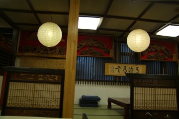 <p>Sit at a traditional Japanese-style table</p>