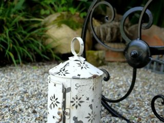 A pretty white tin lantern