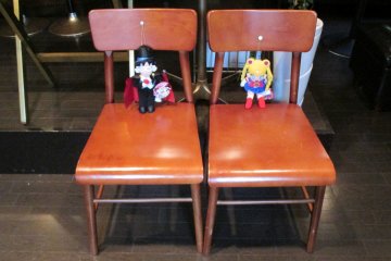 <p>Tuxedo Kamen and Sailor Moon will wait with you to be seated</p>