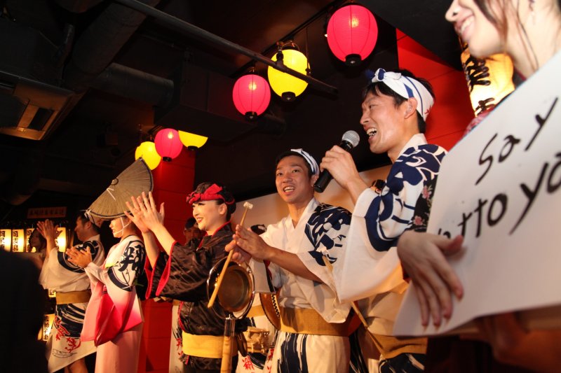 <p>Performers introducing the Awaodori to the customers</p>