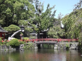 A bridge across the water to a subsidiary shrine