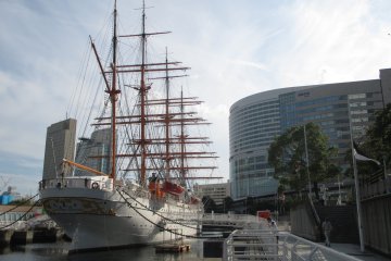 <p>Resting between towers is the Nippon&nbsp;Maru, a ship built in 1930 that now serves as an exhibition area</p>