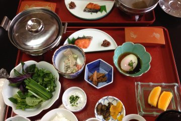 <p>Breakfast, including onsen egg and local new rice. &nbsp;On the left, the dish of green vegetables and the silver pot were for a &quot;vegetable&nbsp;shabu shabu&nbsp;&quot;&nbsp;</p>