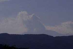 Erupting Mt.&nbsp;Ontake&nbsp;Seen from the Shrine at&nbsp;Torii Pass.