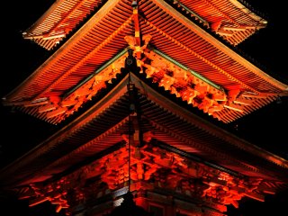 Brilliant vermilion pagoda at night