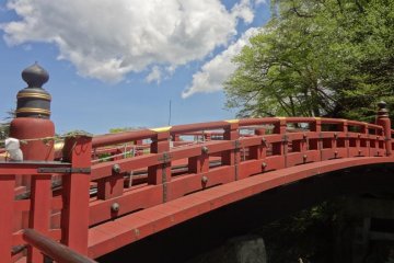 The famous red bridge near the rear approach to Rin-noh-ji temple and Tosho-gu shrine is called Shin-kyo (神橋). It means “bridge of God”.