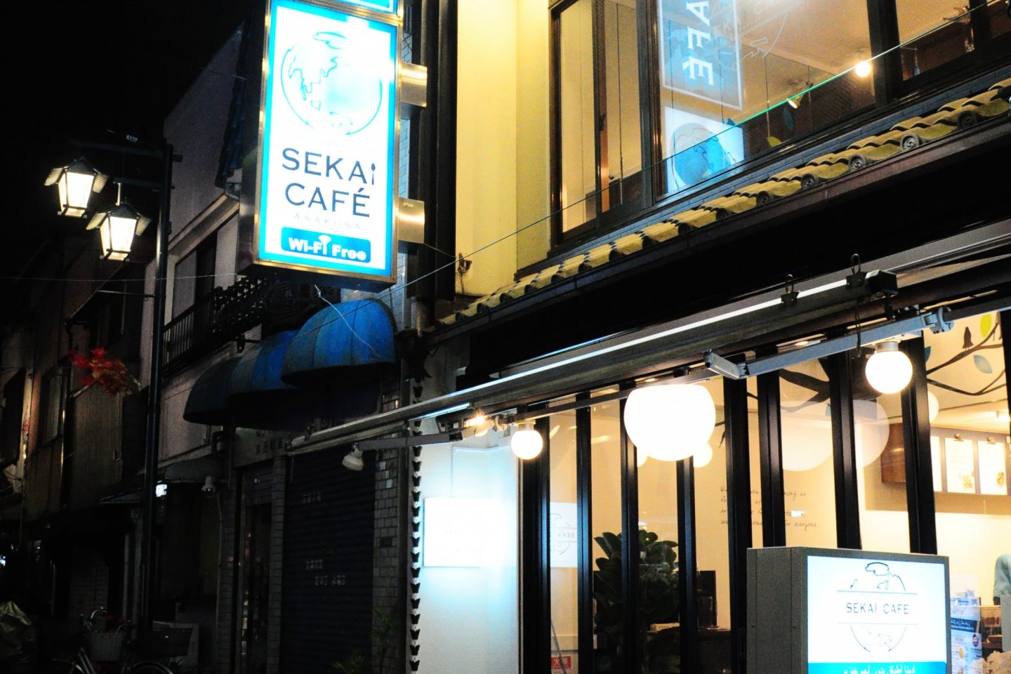 The view in front of the Sekai Cafe. Notice the blue sign board