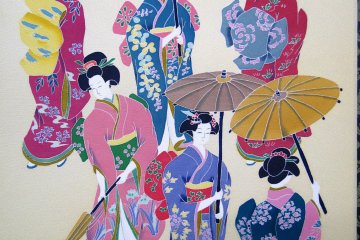 <p>A detailed look at one of the painted kimono</p>