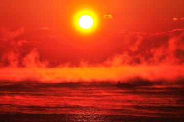 <p>The brilliant madder red sunrise burning in the sky left me speechless</p>