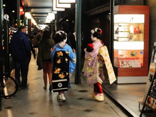 I wonder if they are tourists trying out Maiko costumes? They don&#39;t look like the professional Maiko to me.