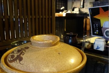 <p>Tofu is cooked in a nabe pot at every table</p>