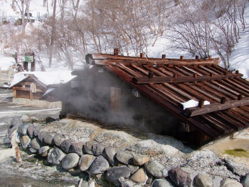 <p>Steam pouring out of the huts</p>