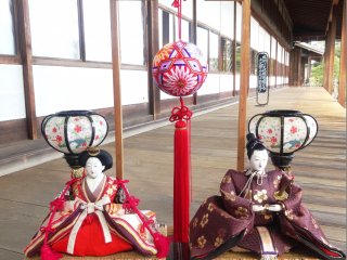 A pair of Hina dolls on the porch near the Shotoen Garden