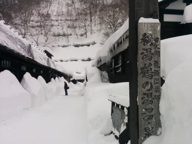<p>The entrance to the small village. Some snow trekking is required to reach the end of the row of houses</p>
