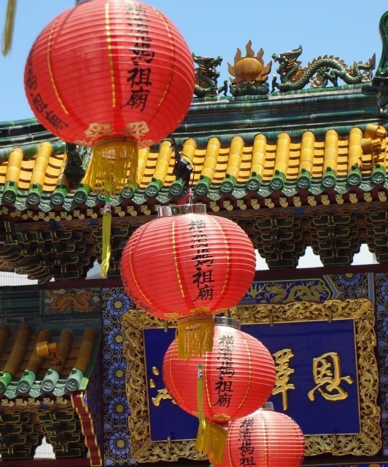 <p>Lanterns hanging in front of the templ</p>