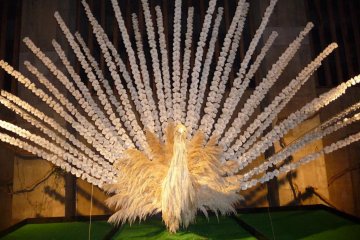 This giant peacock statue located by the entrance is made out of orchids and plant material.  This picture does not do it justice.