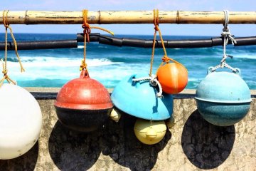 <p>Colourful fishing buoys are among the flotsam that is washed up.</p>