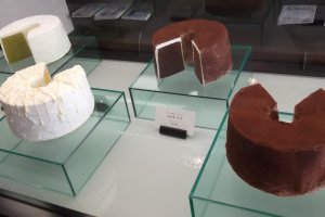 Cakes on display, possibly plastic models