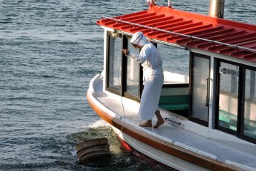 <p>The Ama diver throws the wooden tub overboard... &nbsp;</p>